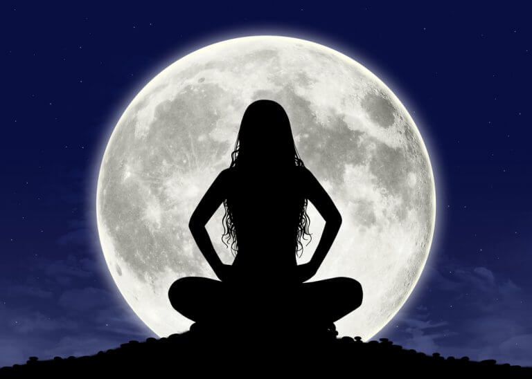 cosmic witchcraft meditating with moon